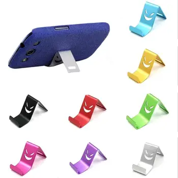 Držalo za telefon Kovinski 1PC Nasmeh Celic Za Huaiwei Xiaomi Samsung Univerzalni Telefon Stander Naključne Barve Pametni Namizni Podstavki